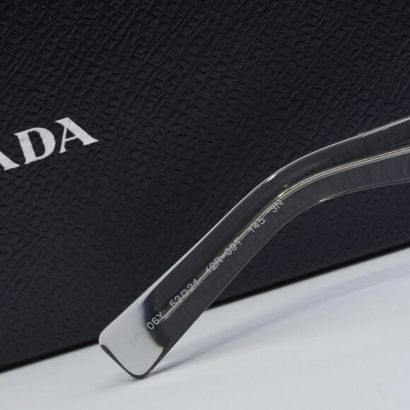 Prada PR06YS 12R09T Rectangle Sunglasses – Transparent Grey\\Dark Grey
